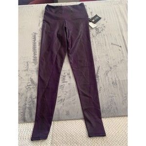 Onzie High Rise Mid rise mulberry with black trim on back . New w/Tags Sz. XS/P